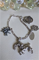 Vintage Italian sterling silver charm bracelet featuring ram and Oregon souvenirs