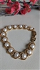 Vintage Napier gold tone fox tail link bracelet with ox pearls and buckle slider