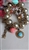 Vintage gold tone chunky stretch charm bracelet with colorful plastic beads and dangles