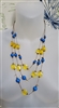 Womens vintage 1991 cascading blue and yellow beaded necklace costume jewelry piece on display form