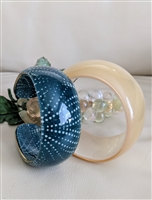 Vintage denim polka dot fabric cuff bracelet and shimmering wavy gold plastic bangle