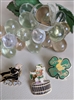 Set of three vintage metal enamel pins including a St Patricks Day duck a beer angel and a clergyman