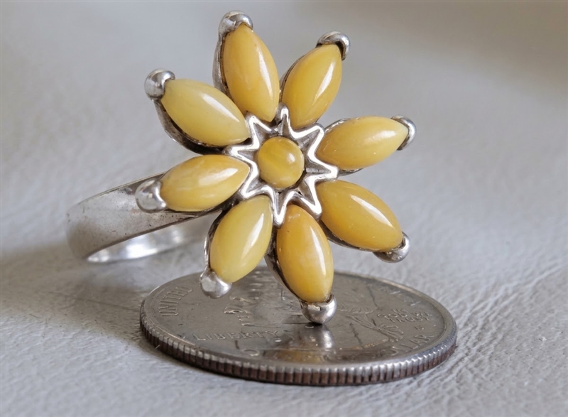 preowned vintage 1990s polish artisan sterling silver statement ring with multiple butterscotch baltic amber floral inserts