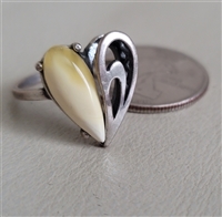 preowned vintage 1990s polish artisan sterling silver statement ring with egg yolk butterscotch baltic amber split heart