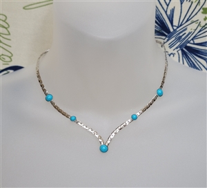 Sarah Coventry vintage silver tone metal choker necklace with blue beads and structured woven chain v style design