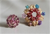 Vintage 1960s multicolor floral wreath brooch and matching pink crystal round pin set