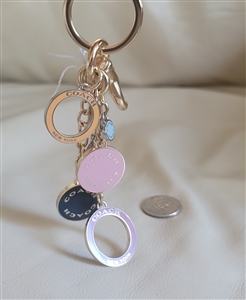 New old stock Coach gold tone multicolor enamel circle cluster bag charm