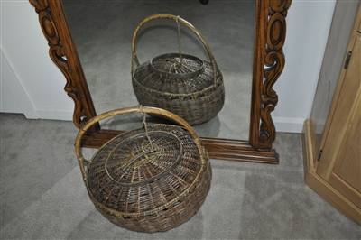 Vintage hand woven Asian folk art bamboo wedding basket decor piece showing lid arched bentwood handle and lacquered finish