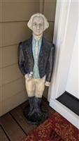 ​Large vintage 1982 Ethan Allen cast metal statue of the Vermont historical figure, 38.5 inches tall, weighing 37 pounds, featuring a wood-grain design and pastel finish on a round base