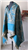 Handmade green and turquoise hue wool shawl wrap from India with grey color combination and fringe detail.