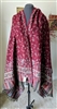 Handmade burgundy and red floral wool shawl from India with green accents and fringe detail.