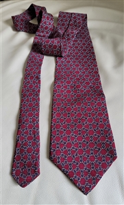 Mens silk necktie By Liberty of London USA vintage fashion collectible in geometrical design over red background