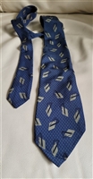 Elegant youthful men Silk Italian necktie ITALY designers collectible wear in geometric pattern over blue background