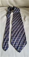 Elegant pattern Calvin Klein vintage Silk necktie blue background and multicolor geometric ovals