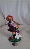 Italian hand painted resin shepherd Nativity decor in colorful hand painted finish with a sheep at his site