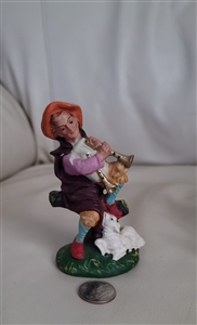Italian hand painted resin shepherd Nativity decor in colorful hand painted finish with a sheep at his site