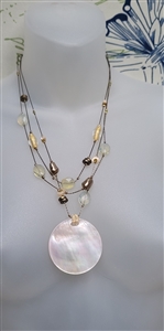 Multi strand beaded necklace with large round abalone shell pendant and leaf logo hangtag