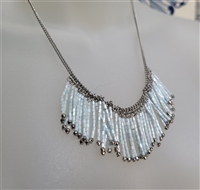 Vintage Indi style silver tone chain necklace with cascading light blue plastic dangles in mother of pearl look