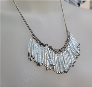 Vintage Indi style silver tone chain necklace with cascading light blue plastic dangles in mother of pearl look