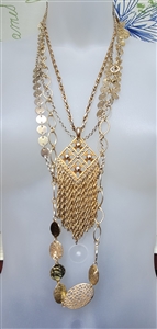 Vintage set of three gold tone long chain necklaces featuring a geometric tassel pendant and textured oval links