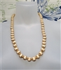 vintage preowned monet satin gold tone textured round bead necklace