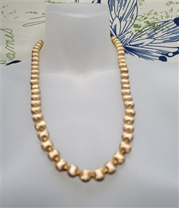 vintage preowned monet satin gold tone textured round bead necklace