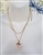 vintage preowned long dangle pink quartz pendant necklace with gold tone chain