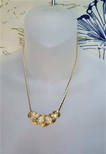 vintage preowned elegant gold tone swirl pendant necklace