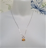 new old stock 1970s gemini zodiac pendant with genuine greenish-gold baltic amber cabochon and 21 inch sterling silver chain
