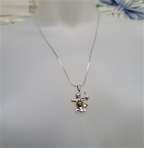 new old stock 1970s sagittarius zodiac pendant with genuine greenish-gold baltic amber cabochon and 21 inch sterling silver chain