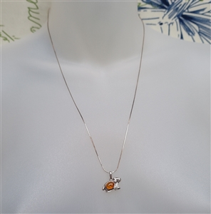 new old stock 1970s aries zodiac ram pendant with honey baltic amber and sterling silver chain