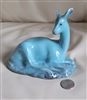 Blue porcelain deer figurine by Beswick England shown from multiple angles with reference coin