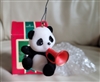 Hallmark handcrafted ornament Trumped Panda Christmas decor, 1985.