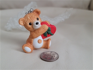 Cinnamon Bear 1988 Hallmark Keepsake ornament sitting bear with a heart shaped box collectible