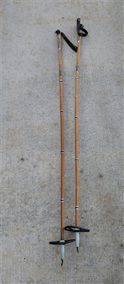 Vintage JOFA Swedish bamboo ski poles with leather wrist straps and black plastic baskets