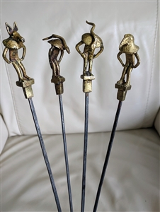 Barbecue skewers with mythical deity beings decor