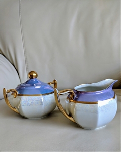 Z S and Co Bavaria antique porcelain lidded sugar bowl and creamer pitcher set with luminescent lustre glaze and gold trim from the 1900s