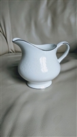 Wedgwood Silver Ermine bone china creamer pitcher in Contour shape with white embossed florals and platinum trim from the 1960s