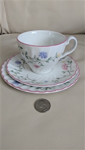 ​Johnson Brothers Summer Chintz white earthenware teacup saucer and plate set with multicolor floral pattern and pink scalloped rim