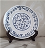 Homer Laughlin white porcelain plate 10-1/8" in a blue floral design.
