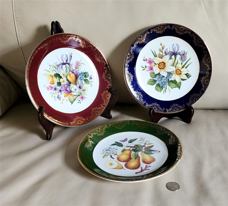 Weatherby Royal Falcon set of three decorative plates in burgundy navy blue and olive green with floral and pear designs