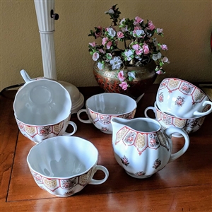 Vintage Lomonosov Soviet Russian porcelain set featuring 6 teacups and a tulip creamer decorated with a red rose pattern and red LFZ backstamp
