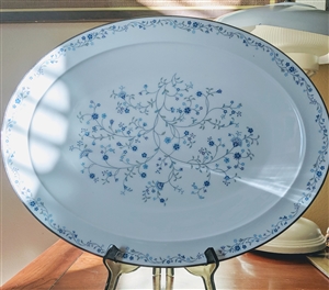 preowned vintage Noritake Serene Garden 16 inch oval platter with blue floral design