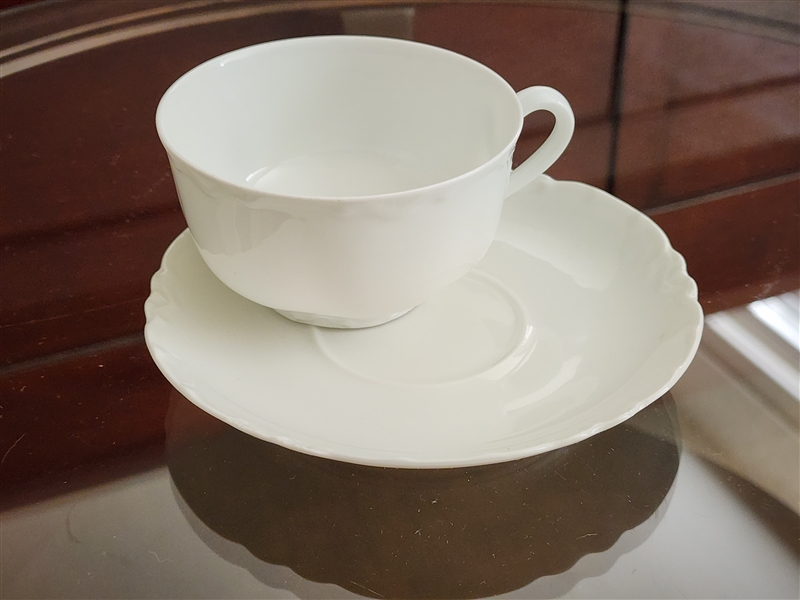 Haviland France white embossed porcelain teacup and saucer in elegant design