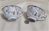 NAPCO porcelain set of two teacups gold embossed collectible vintage table setting kitchen accessories
