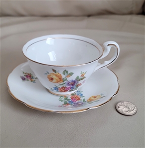 English porcelain teacup and saucer by Vanderwood collectible tea time tale setting