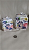 Two Vintage Japan Bisque Porcelain Crown Mark Story Jars Large and Small