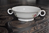 Vintage 1958 Theodore Haviland Pasadena footed cream soup bowl with looped handles and multicolor floral sprays on ivory porcelain with gold accents