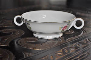 Vintage 1958 Theodore Haviland Pasadena footed cream soup bowl with looped handles and multicolor floral sprays on ivory porcelain with gold accents
