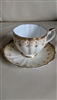 Victoria C and E bone china English teacup saucer collectible white yellow and gold design in embossed pattern porcelain